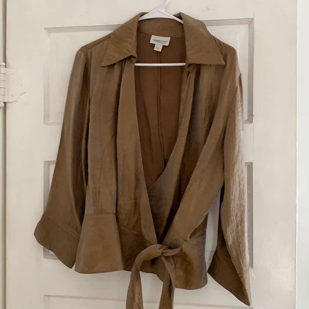 Gold blouse. Long sleeves tie up in the front.